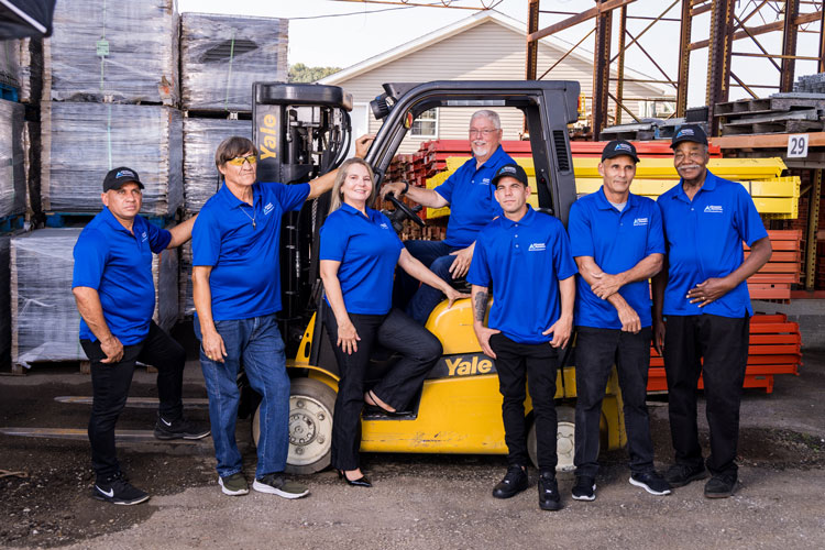 Team photo by forklift
